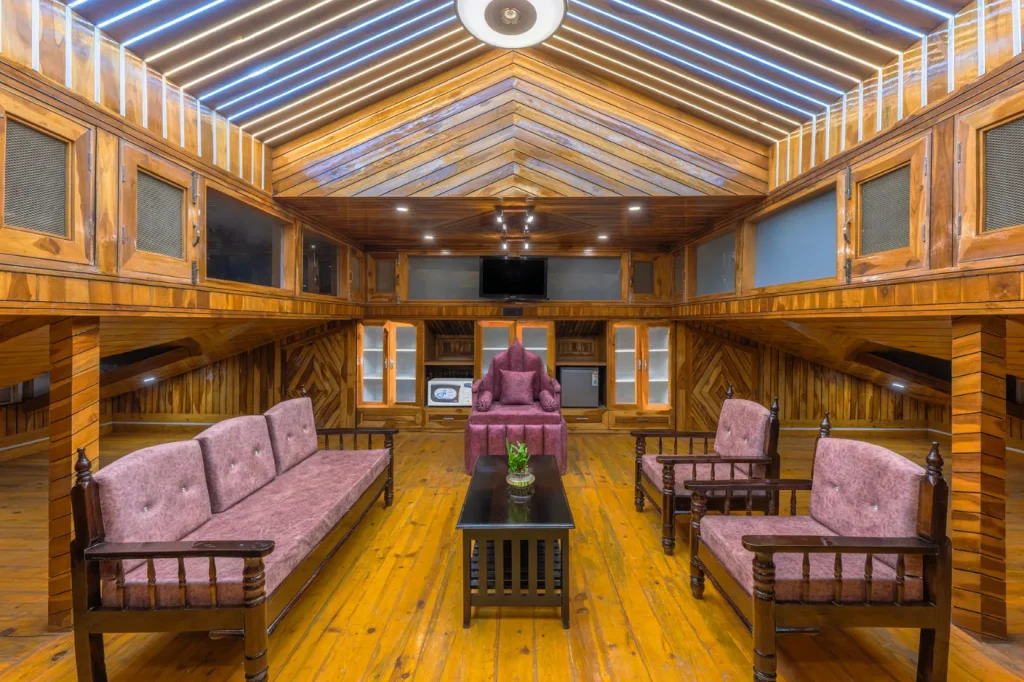 Premium lounge area in one of the best villas in Kasauli with wooden interiors.